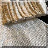 N01. Set of 12 Waterford waffle weave napkins and matching oval tablecloth. - $44 